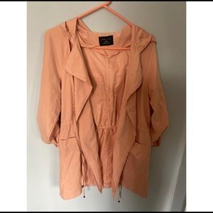 Soft pink blazer style jacket with hood